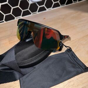 Oakley Men's Sunglasses - Black Frame with Red and Yellow Lenses